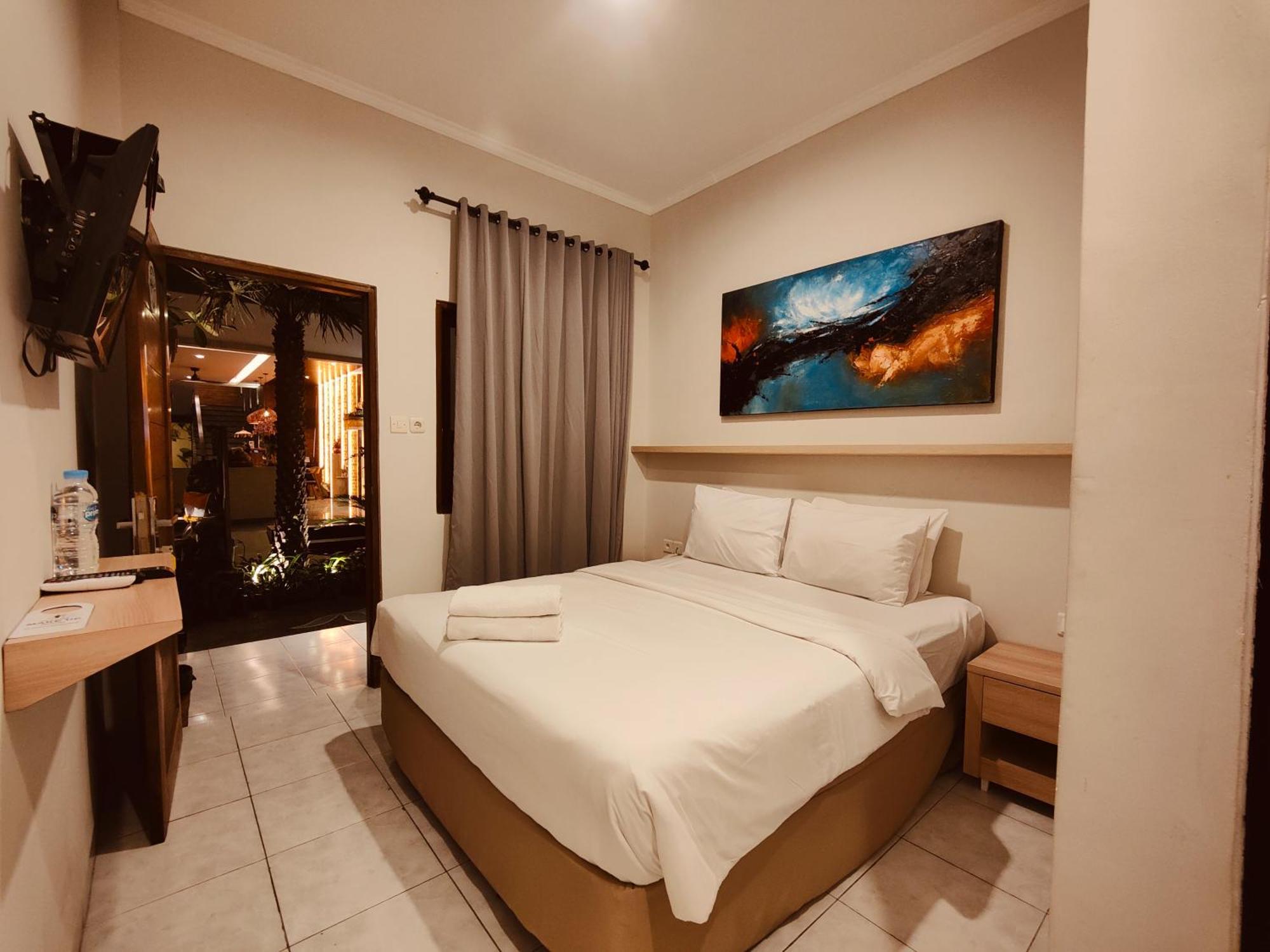 Rabasta Enjoy Kuta Hotel Кута Екстериор снимка