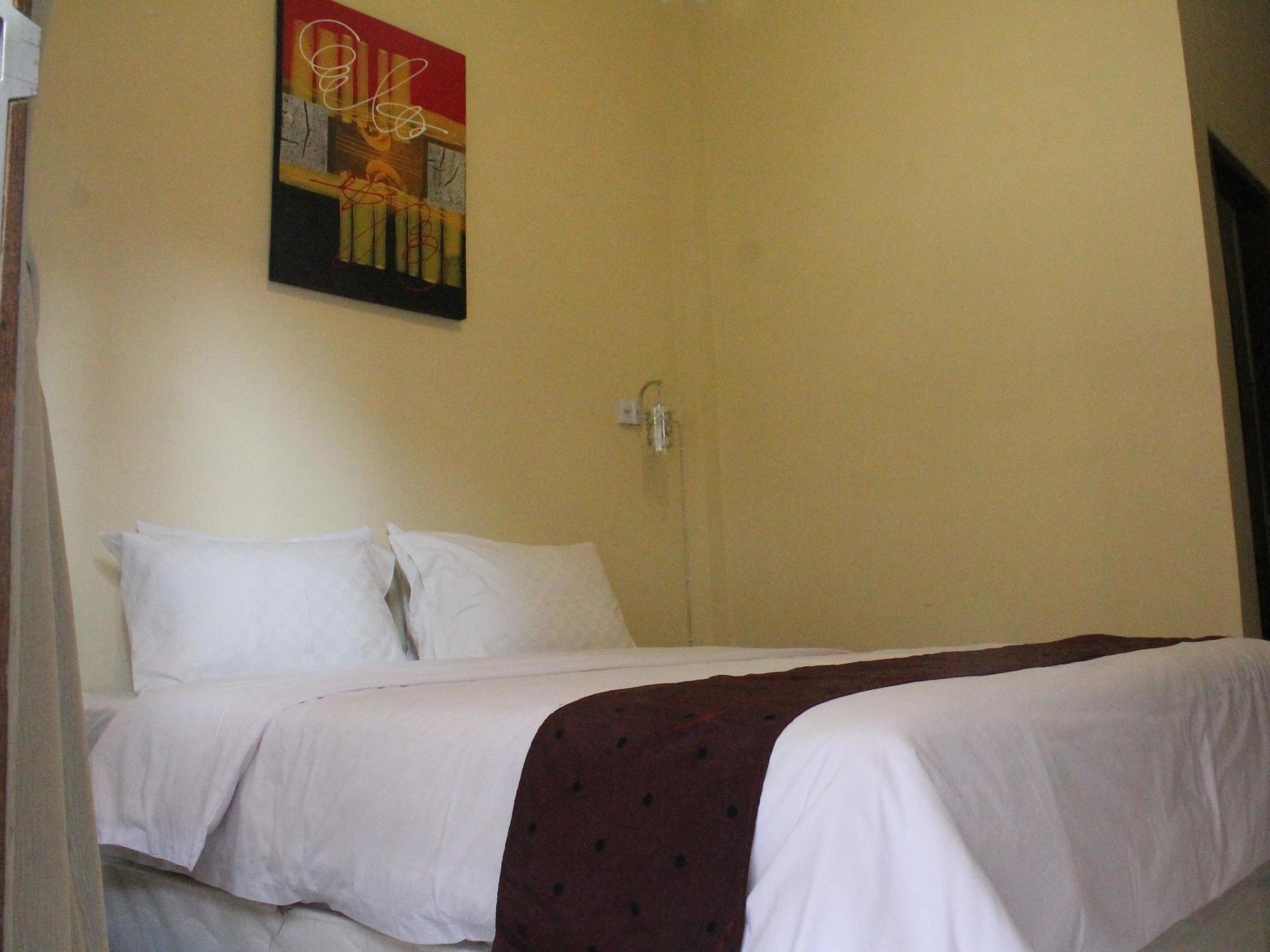 Rabasta Enjoy Kuta Hotel Кута Екстериор снимка